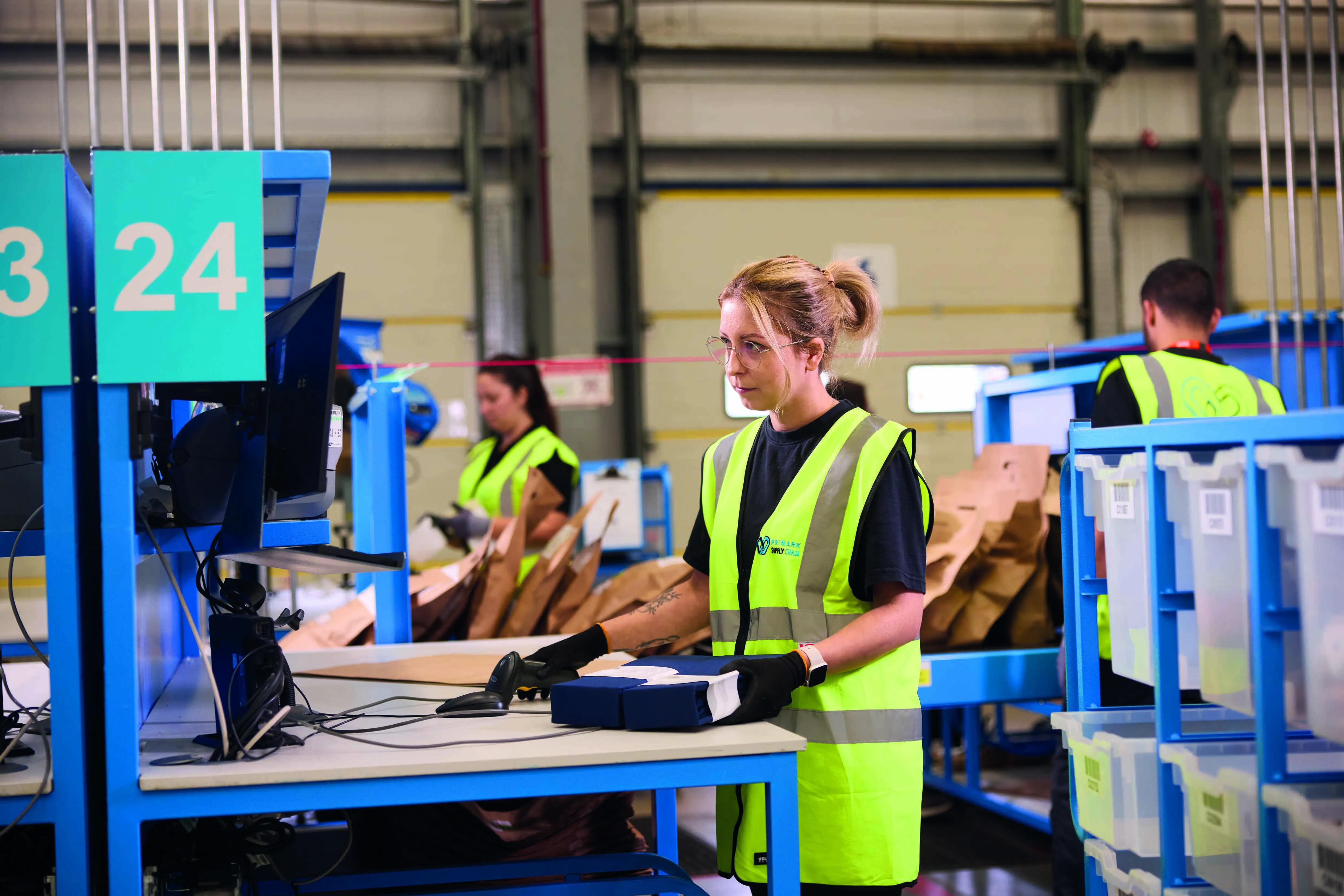 Packing orders at our Primark Click & Collect depot at Magna Park, UK
