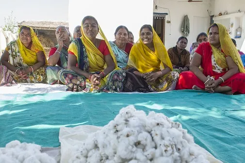 Field training session.
Featuring at front of group:
L-R: Kanchan-ben (red blouse, yellow scarf with red stripes trim, and purple scarf also)
Hiru-ben (plain yellow scarf)
Vanita-ben (red blouse, yellow wavy checked pattern scarf)
Primark supported CottonConnect / SEWA project.
Mayapur village, Gujarat, India