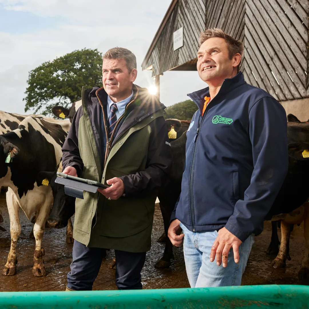One of our AB Agri consultants with a client farmer on their farm in Somerset, UK