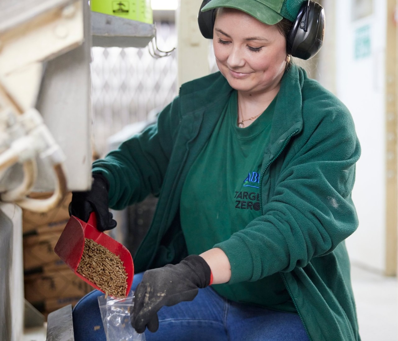 A colleague sampling feed at our ABN mill, Enstone, UK