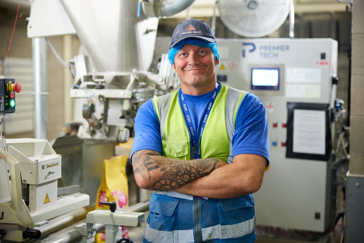 A colleague at the Allied Mills flour mill in Manchester, UK