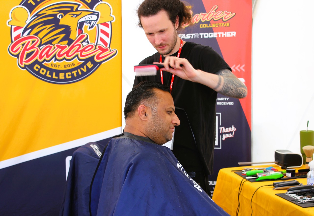 The Lions Barber Collective, a team of barbers raising awareness of men's mental health, cut hair and talk at the AWBF Safety Day.